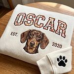Cream Oscar custom dachshund portrait sweatshirt with floral varsity name, EST. 2020, and paw print sleeve
