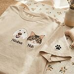 Custom dog and cat portrait embroidered T-shirt in beige with personalized names and paw print sleeve embroidery