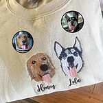 Butter yellow sweatshirt with two custom embroidered dog portraits named Honey and Lola with reference photo insets
