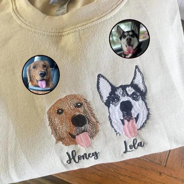 Butter yellow sweatshirt with two custom embroidered dog portraits named Honey and Lola with reference photo insets