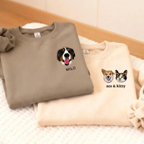 Two custom pet portrait embroidered sweatshirts with one dog and a dog-and-cat pair plus personalized names