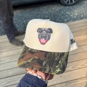 Customer photo of a custom dog portrait embroidered cap with a camouflage brim