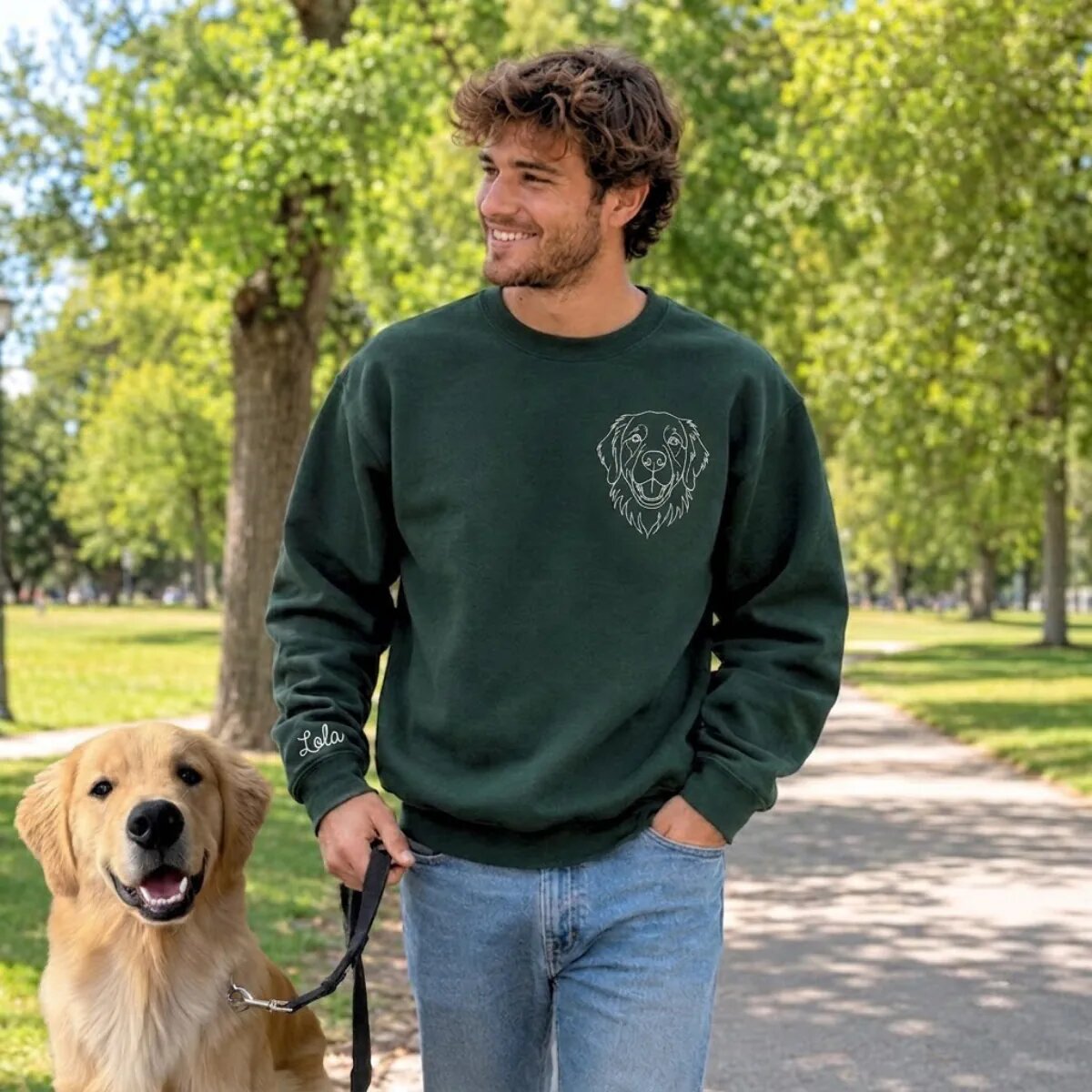 embroidered-dog-dad-sweatshirt-outdoor-golden-retriever Dog dad walking a Golden Retriever in a forest green custom pet portrait sweatshirt