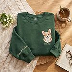Forest green personalized corgi portrait sweatshirt with embroidered EST. 2025 text and sleeve names