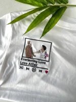 White custom embroidered t-shirt showcasing a wedding couple portrait in polaroid frame with Everlasting Love music player bar and heart icon