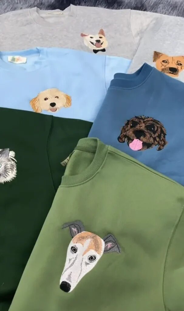 Dog portraits stitched on sweatshirts in gray, light blue, steel blue and green
