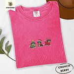 Crunchberry Comfort Colors T-shirt embroidered with three tricolor Bernese mountain dog puppies in a Christmas tree costume, a Santa hat with a red scarf and reindeer antlers with a red sweater