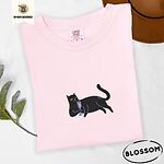 Blossom Comfort Colors T-shirt embroidered with a black cat lounging on its side holding a stemmed glass of pink wine