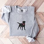 Sport Grey crewneck sweatshirt on herringbone wood with a larger black Labrador silhouette in a hot pink collar centered on the chest