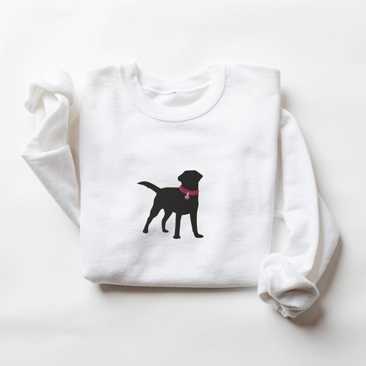 Black Lab Silhouette Sweatshirt - center chest White White crewneck sweatshirt with a larger black Labrador silhouette in a hot pink collar centered on the chest