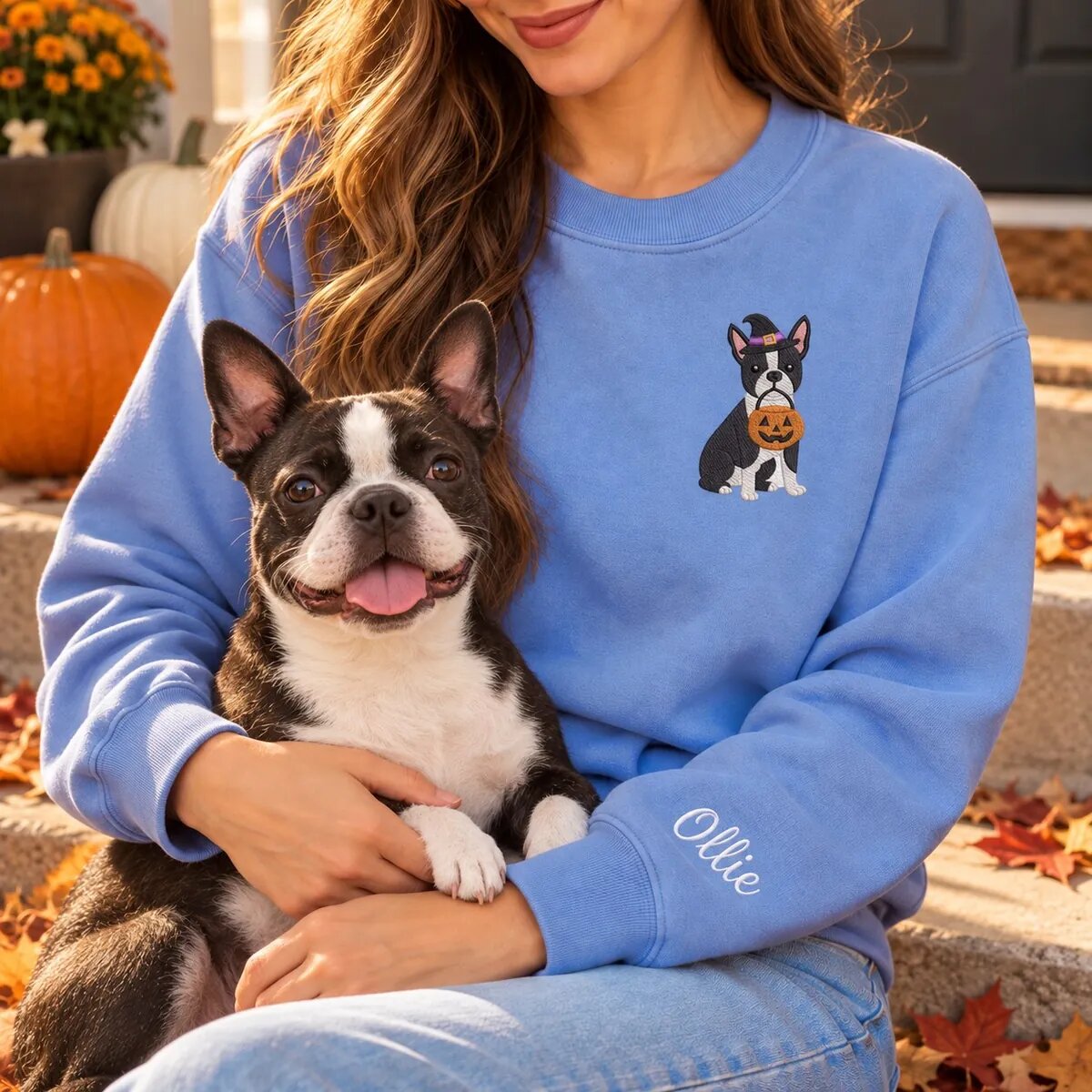 Boston Terrier Mom Halloween Sweatshirt Worn Boston Terrier mom wearing the Heather Deep Royal Halloween sweatshirt with her Boston Terrier on a fall porch