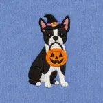 Close-up of the embroidered Boston Terrier in a witch hat with a jack-o'-lantern candy bucket