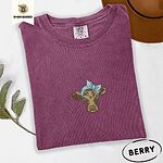 Berry Comfort Colors T-shirt embroidered with a brown calf head wearing a light blue bandana tied in a bow