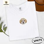 White Comfort Colors T-shirt embroidered with a mini Cavachon face in cream and apricot with a white muzzle