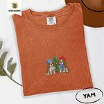 Yam Comfort Colors T-shirt embroidered with two Blenheim Cavalier King Charles Spaniels in knit beanies beside a little lit Christmas tree