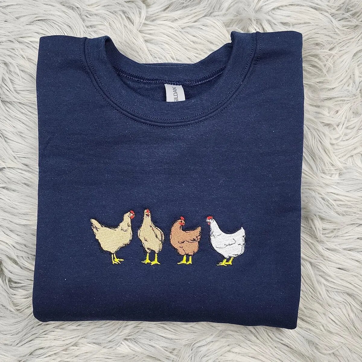 Chicken Crewneck – Navy Navy chicken crewneck with four embroidered farm hens with yellow feet and red combs