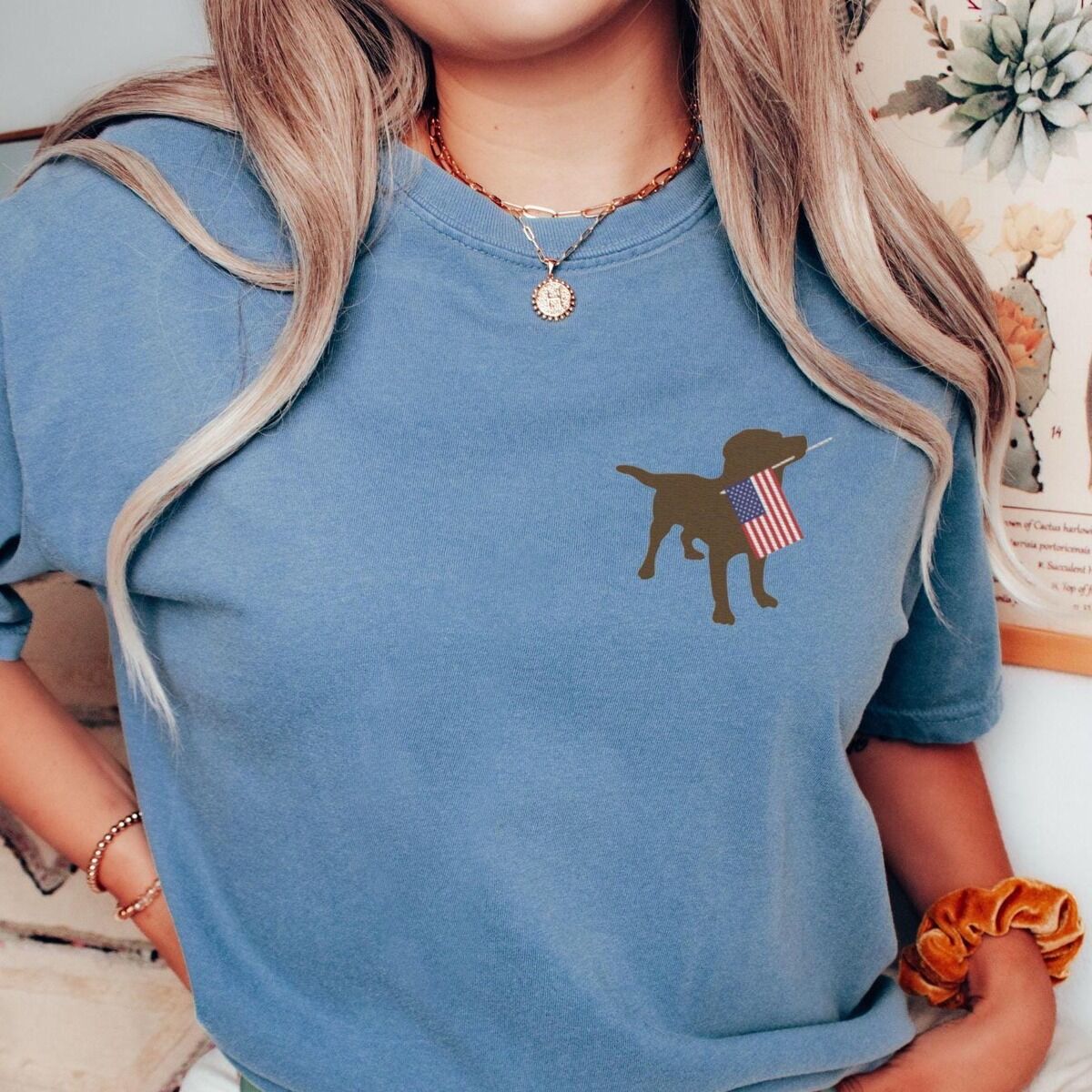 Chocolate Lab American Flag Shirt – Blue Jean Woman in a Blue Jean T-shirt with a small chocolate lab silhouette and USA flag stitched on the left chest