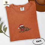 Yam Comfort Colors T-shirt embroidered with a chocolate Labrador puppy lying down in a red Santa hat and a red knit scarf