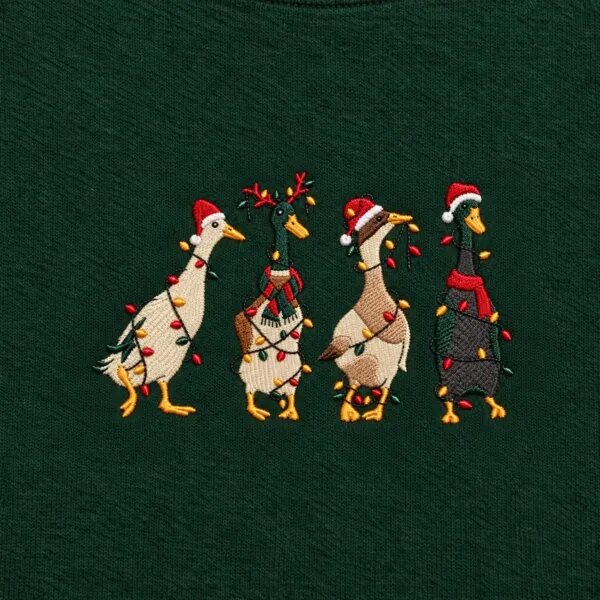 Close-up of the embroidered Christmas ducks in Santa hats, antlers and scarves tangled in Christmas lights