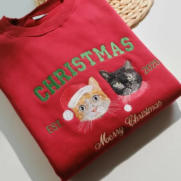 Red Christmas sweatshirt with an orange cat and a black cat embroidered from photos, both in Santa hats