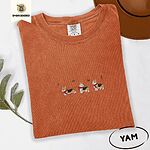 Yam Comfort Colors T-shirt embroidered with three tricolor corgis in red knit scarves among sprigs of holly