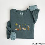 Blue Spruce crewneck sweatshirt laid flat with rolled sleeves, embroidered with four corgis under a crescent moon with bats, gold sparkles and a jack-o'-lantern