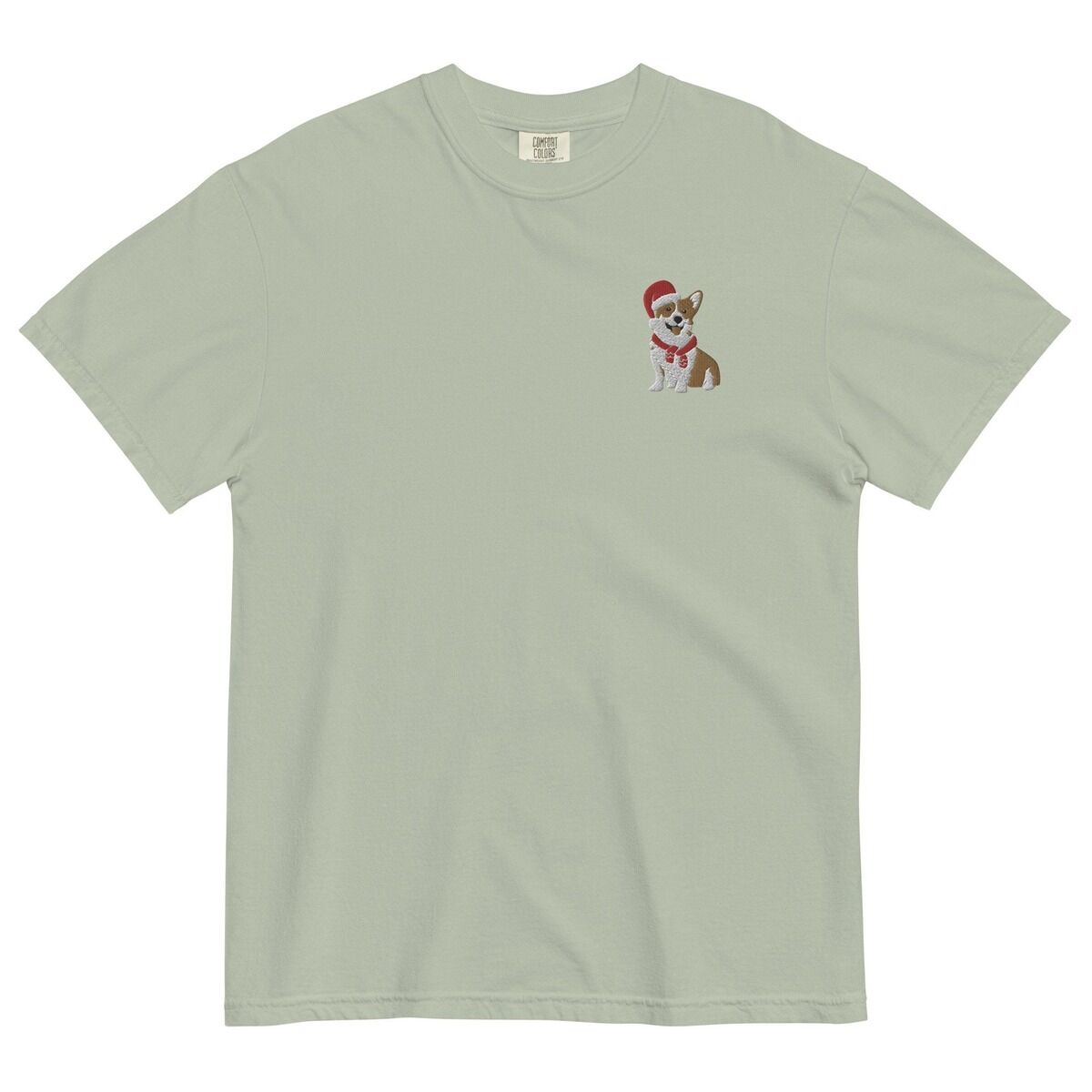 Corgi Santa Hat Shirt – Bay Bay T-shirt laid flat on a white background, embroidered with a smiling red and white Pembroke corgi in a Santa hat and striped red scarf on the left chest