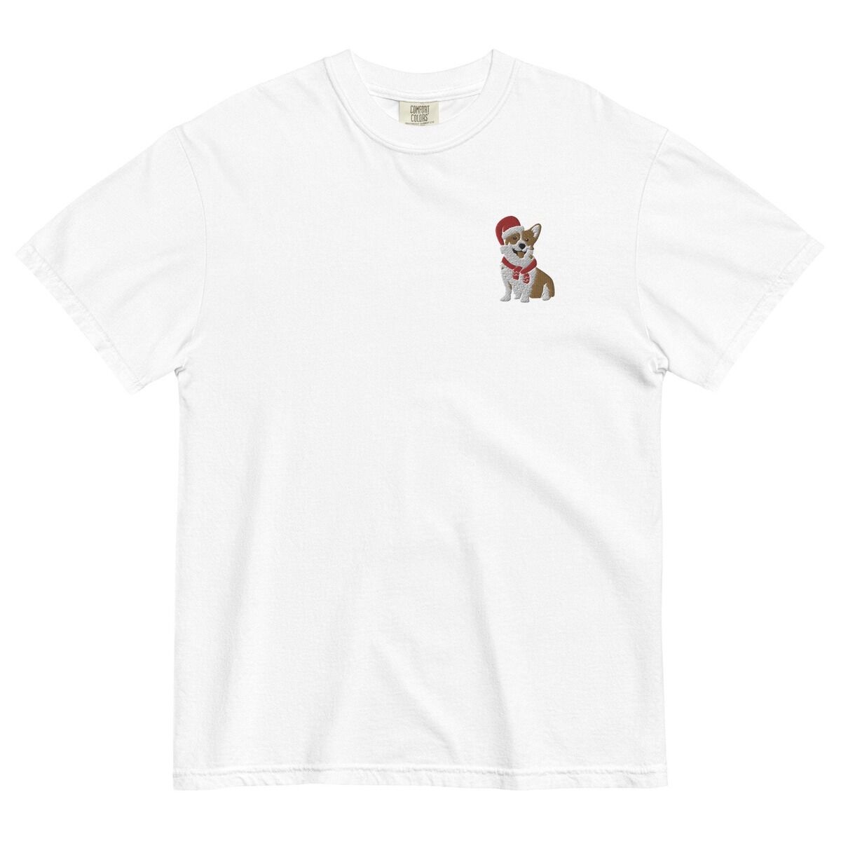Corgi Santa Hat Shirt – White White T-shirt laid flat on a white background, embroidered with a smiling red and white Pembroke corgi in a Santa hat and striped red scarf on the left chest