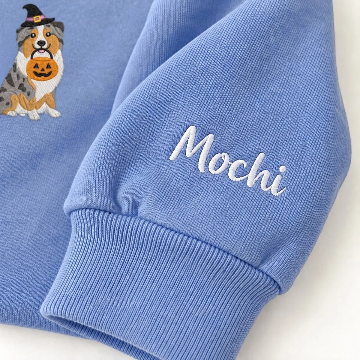 Custom Australian Shepherd Sweatshirt – Name on the Sleeve Custom Australian Shepherd sweatshirt with the dog name Mochi embroidered on the sleeve