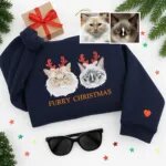 Navy custom embroidered cat Christmas sweatshirt with two cat portraits in red reindeer antlers, Furry Christmas text and a heart on the sleeve