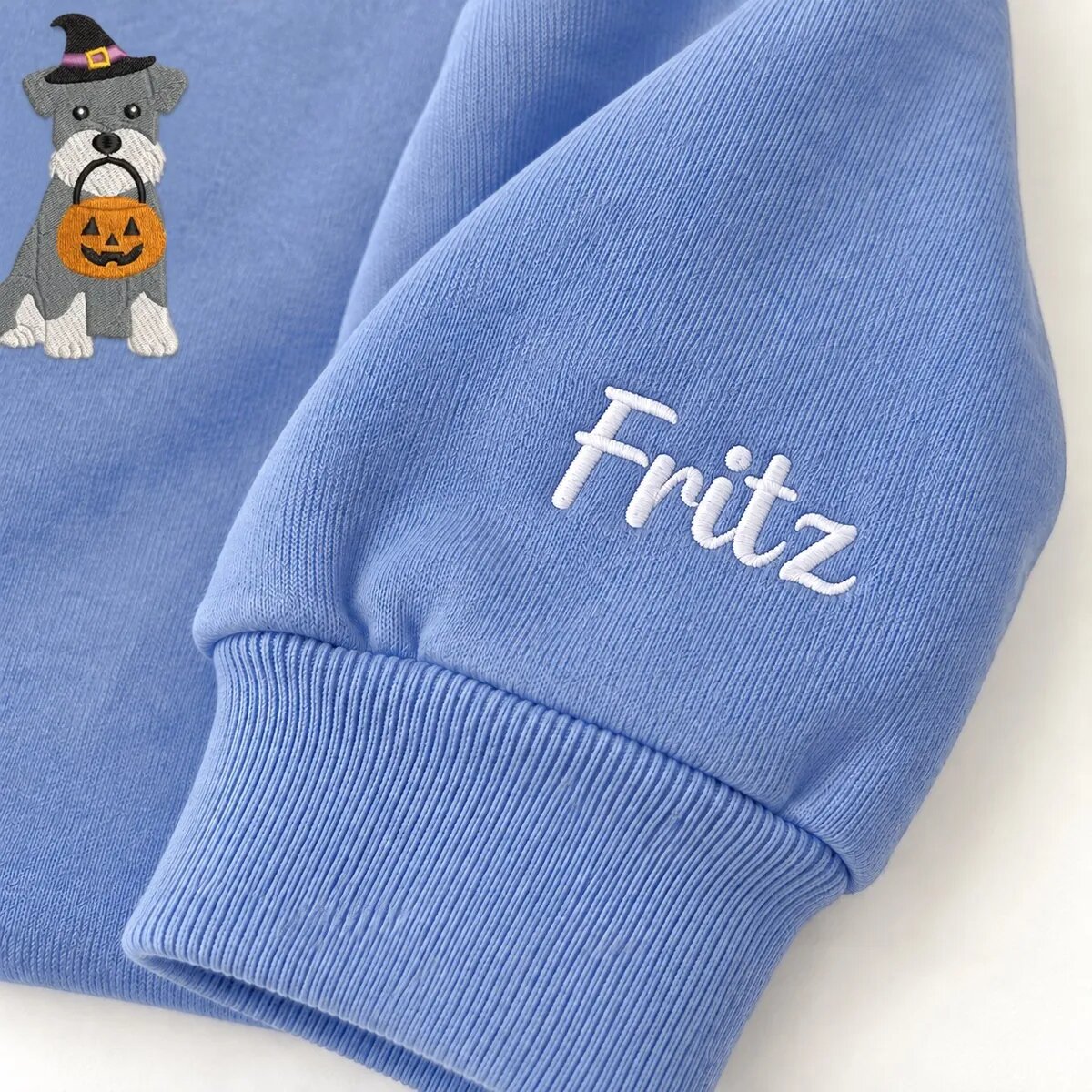 Custom Miniature Schnauzer Sweatshirt – Name on the Sleeve Custom Miniature Schnauzer sweatshirt with the dog name Fritz embroidered on the sleeve