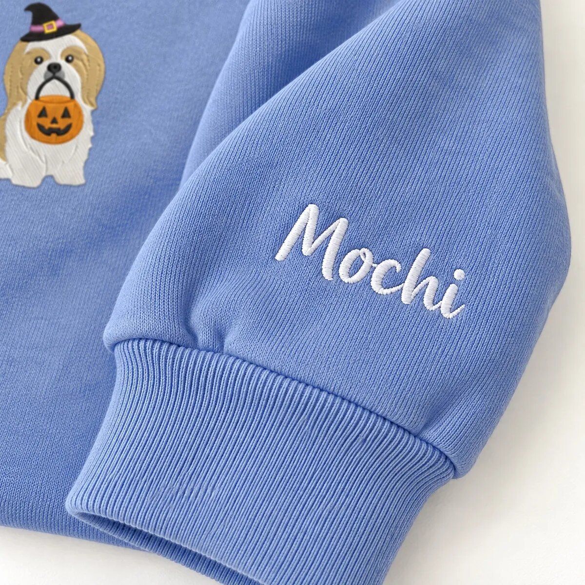 Custom Shih Tzu Sweatshirt – Name on the Sleeve Custom Shih Tzu sweatshirt with the dog name Mochi embroidered on the sleeve
