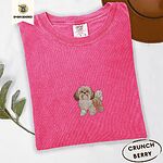 Crunchberry Comfort Colors T-shirt embroidered with a gold and white Shih Tzu puppy with a long silky coat and a plumed tail