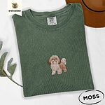 Moss Comfort Colors T-shirt embroidered with a gold and white Shih Tzu puppy with a long silky coat and a plumed tail