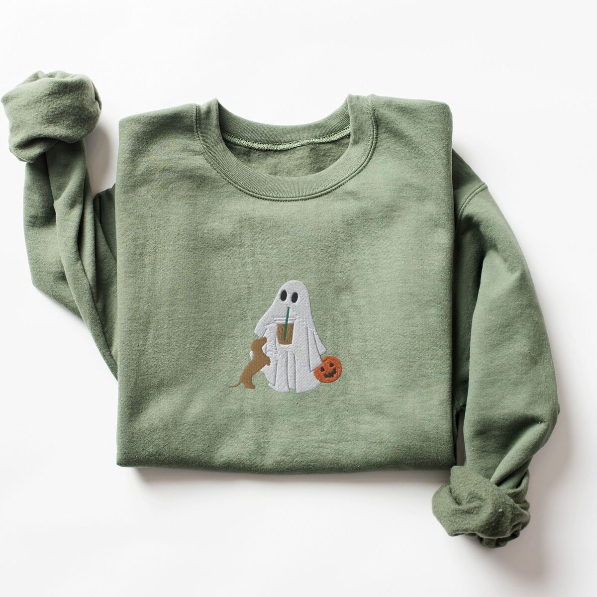 Dachshund Ghost Coffee Sweatshirt - red doxie on Military Green Military Green crewneck sweatshirt laid flat on white, embroidered with a ghost sipping iced coffee, a red dachshund standing up at her side and a jack-o'-lantern pail