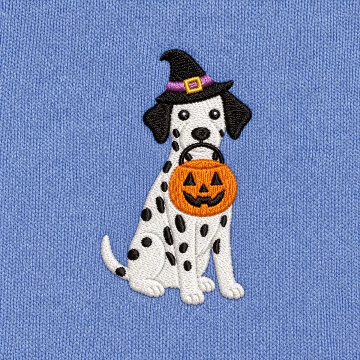 Dalmatian Witch Hat Embroidery Close-up Close-up of the embroidered Dalmatian in a witch hat with a jack-o'-lantern candy bucket