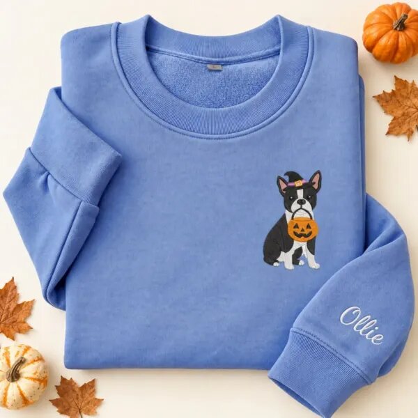 Embroidered Boston Terrier Halloween sweatshirt in Heather Deep Royal with a witch-hat Boston Terrier holding a pumpkin bucket on the left chest