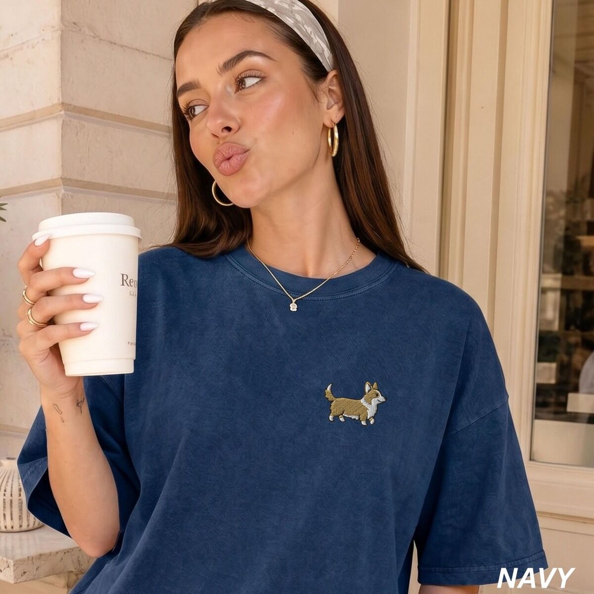 Embroidered Corgi Shirt – Navy Navy Comfort Colors T-shirt embroidered with a cute cartoon corgi in golden tan and white trotting on the left chest