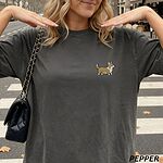 Pepper Comfort Colors T-shirt embroidered with a cute cartoon corgi in golden tan and white trotting on the left chest