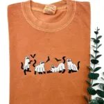 Yam orange T-shirt with four embroidered ghost cats and bats across the chest