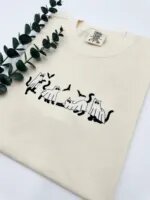 Ivory T-shirt with ghost cats and bats embroidered in black and white thread