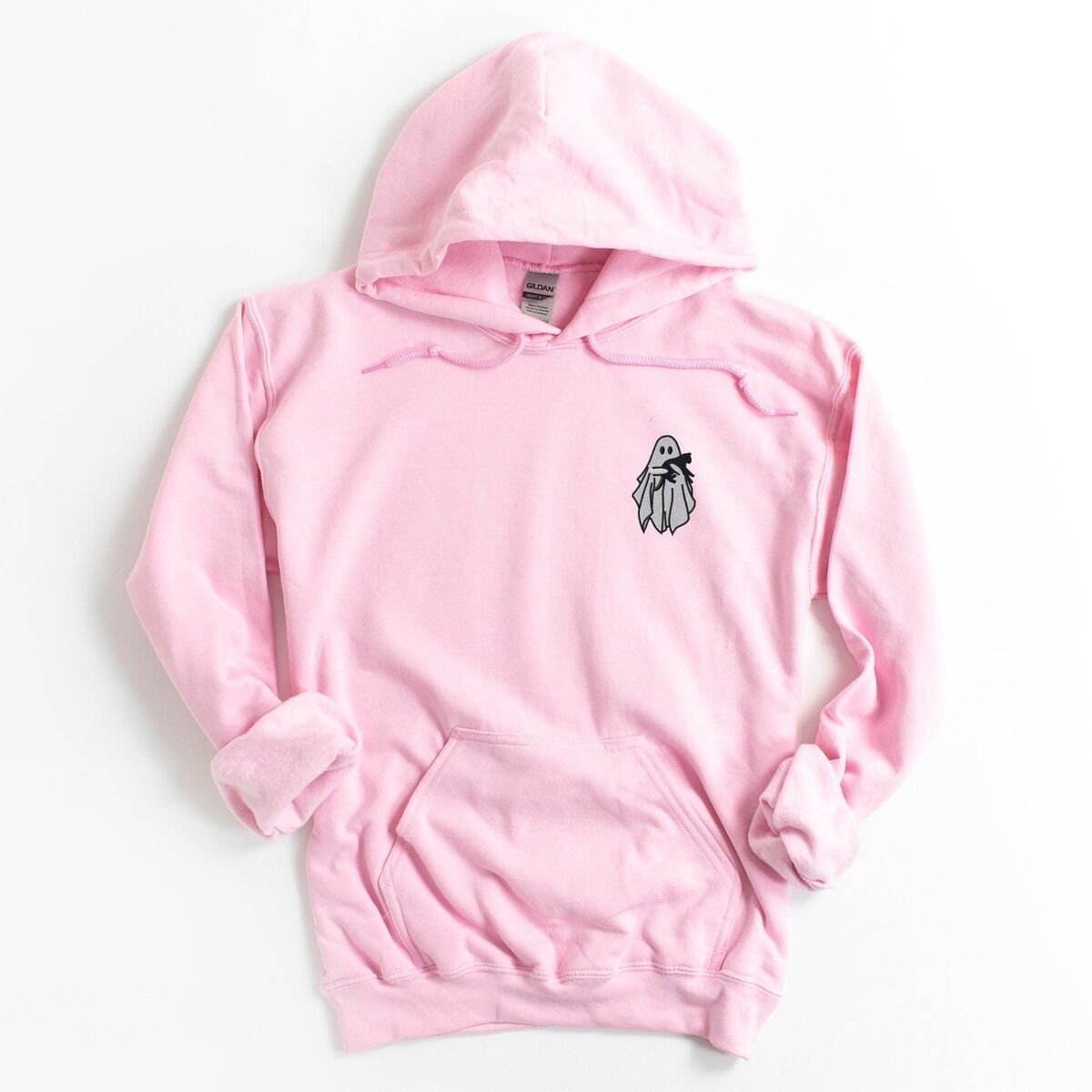 Embroidered Ghost Hoodie – Light Pink Light Pink Gildan 18500 hoodie embroidered with a little white ghost hugging a black cat on the left chest