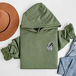 Military Green Gildan 18500 hoodie embroidered with a little white ghost hugging a black cat on the left chest
