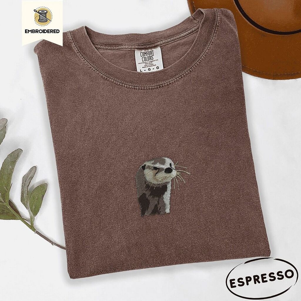 Comfort Colors 1717 T-shirt in Espresso with an embroidered river otter head