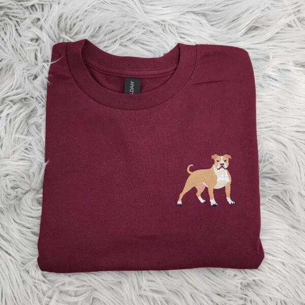 Embroidered pitbull shirt in maroon with a small fawn and white pit bull stitched on the left chest like a pocket logo
