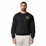 Man wearing a Black embroidered poodle sweatshirt with a mini apricot poodle on the left chest