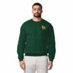 Man wearing a Forest Green embroidered poodle sweatshirt with a mini apricot poodle on the left chest
