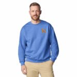 Man wearing a Heather Deep Royal embroidered poodle sweatshirt with a mini apricot poodle on the left chest