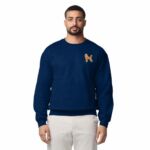 Man wearing a Navy embroidered poodle sweatshirt with a mini apricot poodle on the left chest