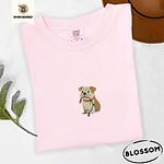 Blossom Comfort Colors T-shirt embroidered with a fawn and cream English bulldog puppy in a red collar chewing a string of Christmas lights